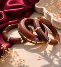 Artisan-crafted set of three wooden bangles