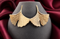 Women's botanical gold ginkgo leaf statement stud earrings