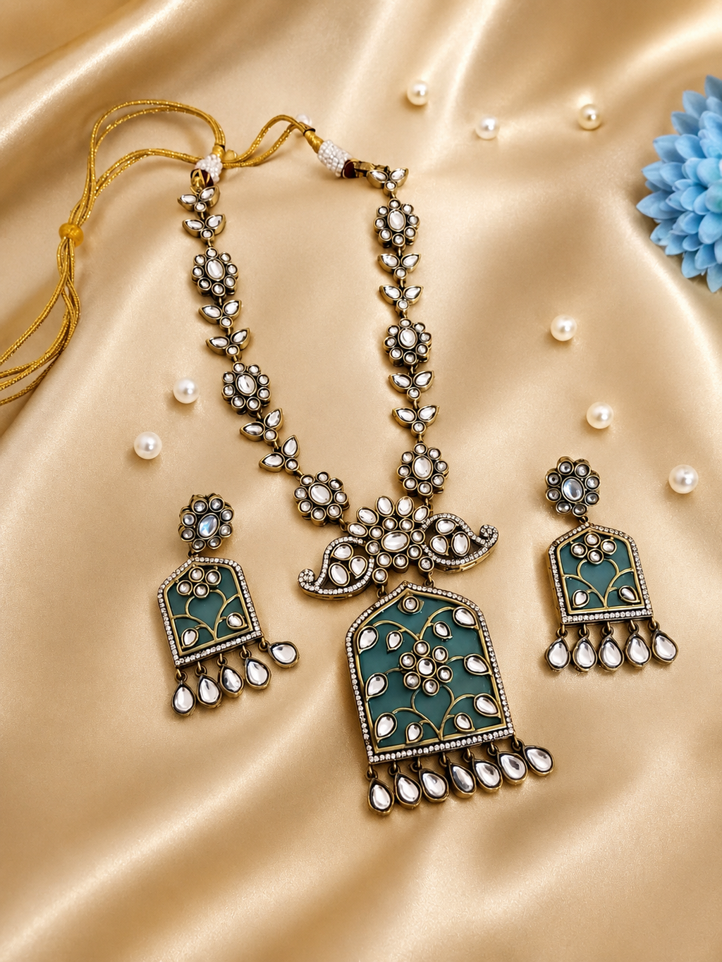 Antique gold-plated Kundan and pastel green jewelry set