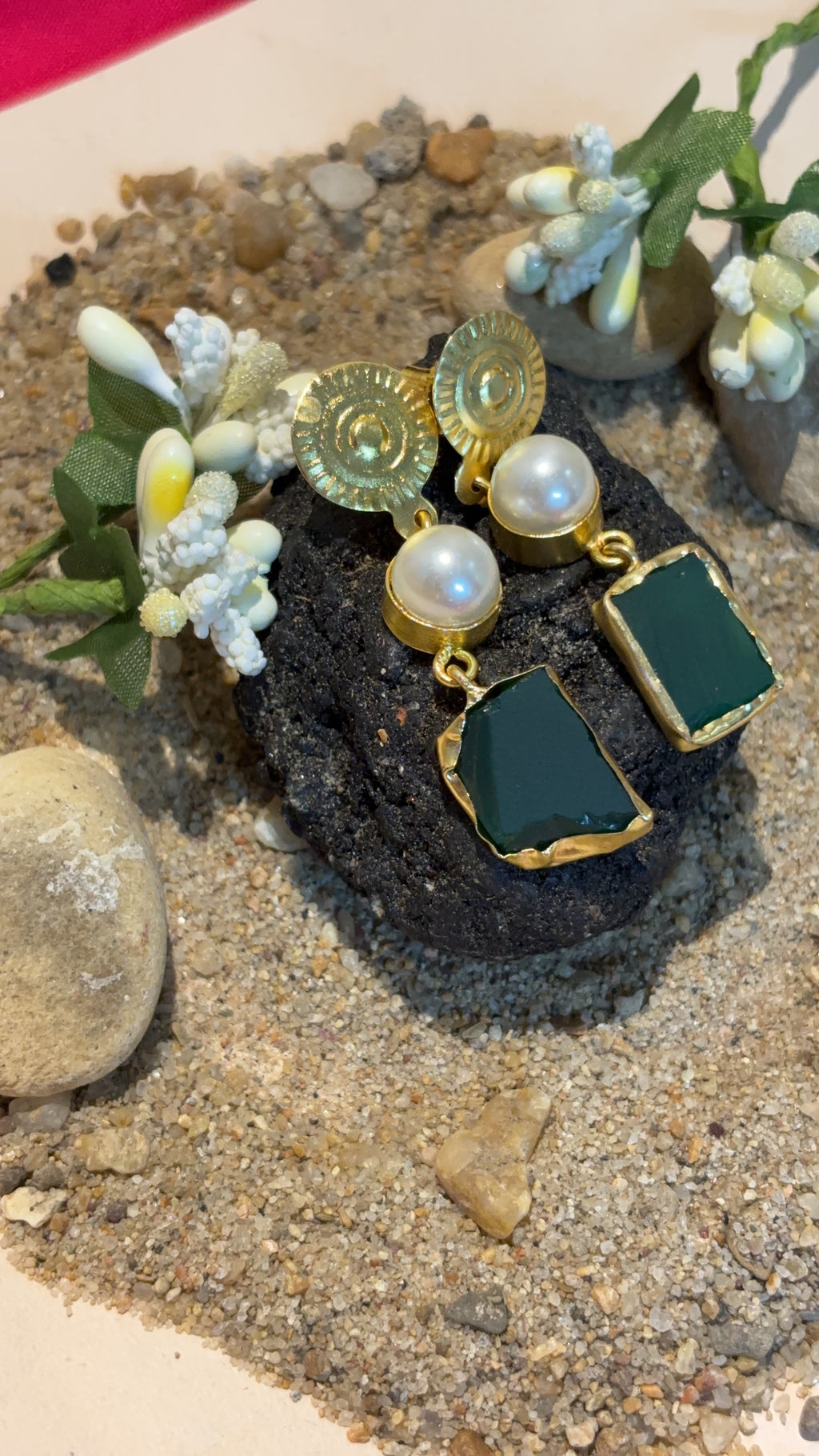 Brass pearl earring with uncut green stone