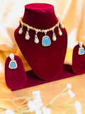 Aqua blue stone with polki stone brass necklace