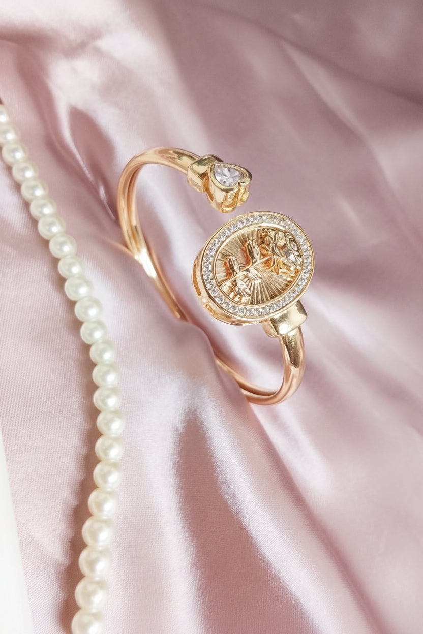 Gold-Plated Virgin Mary Oval Medallion Bangle with Cubic Zirconia Border