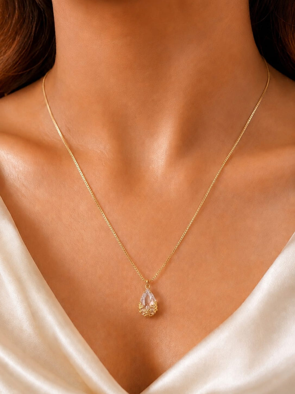 Gold-plated faux emerald teardrop pendant necklace