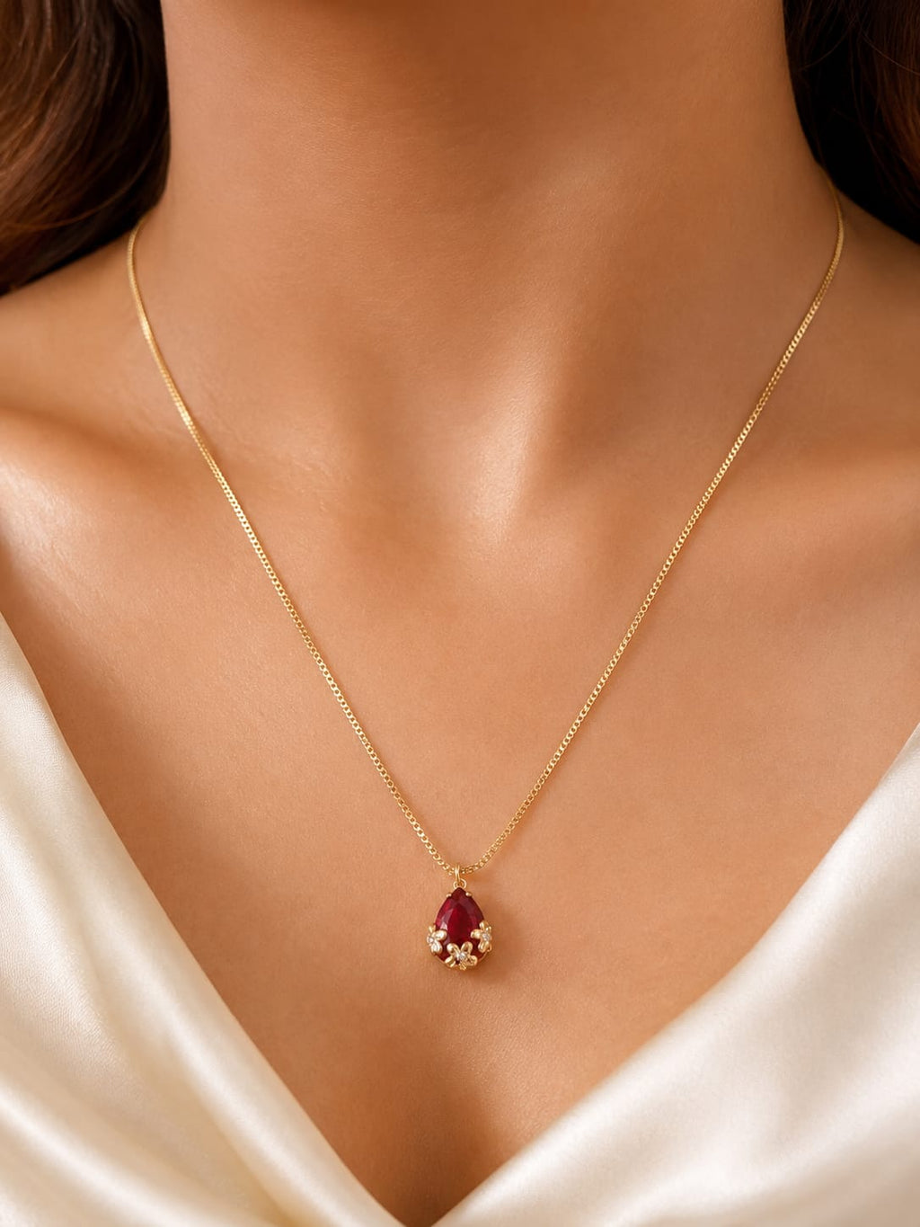 Gold-plated faux emerald teardrop pendant necklace