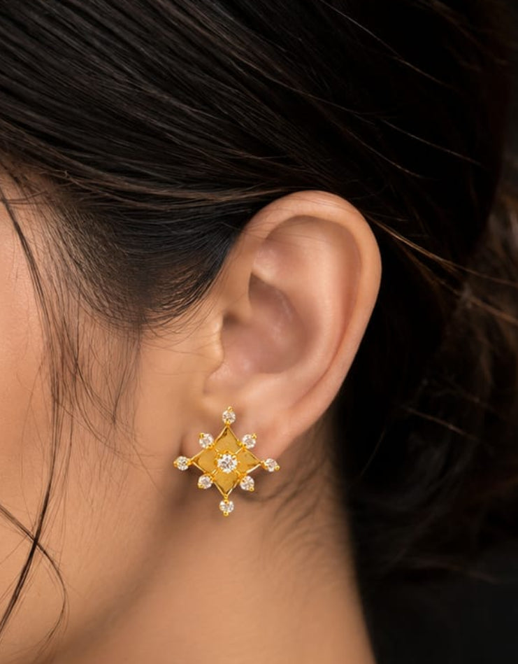 Gold-toned starburst stud earrings