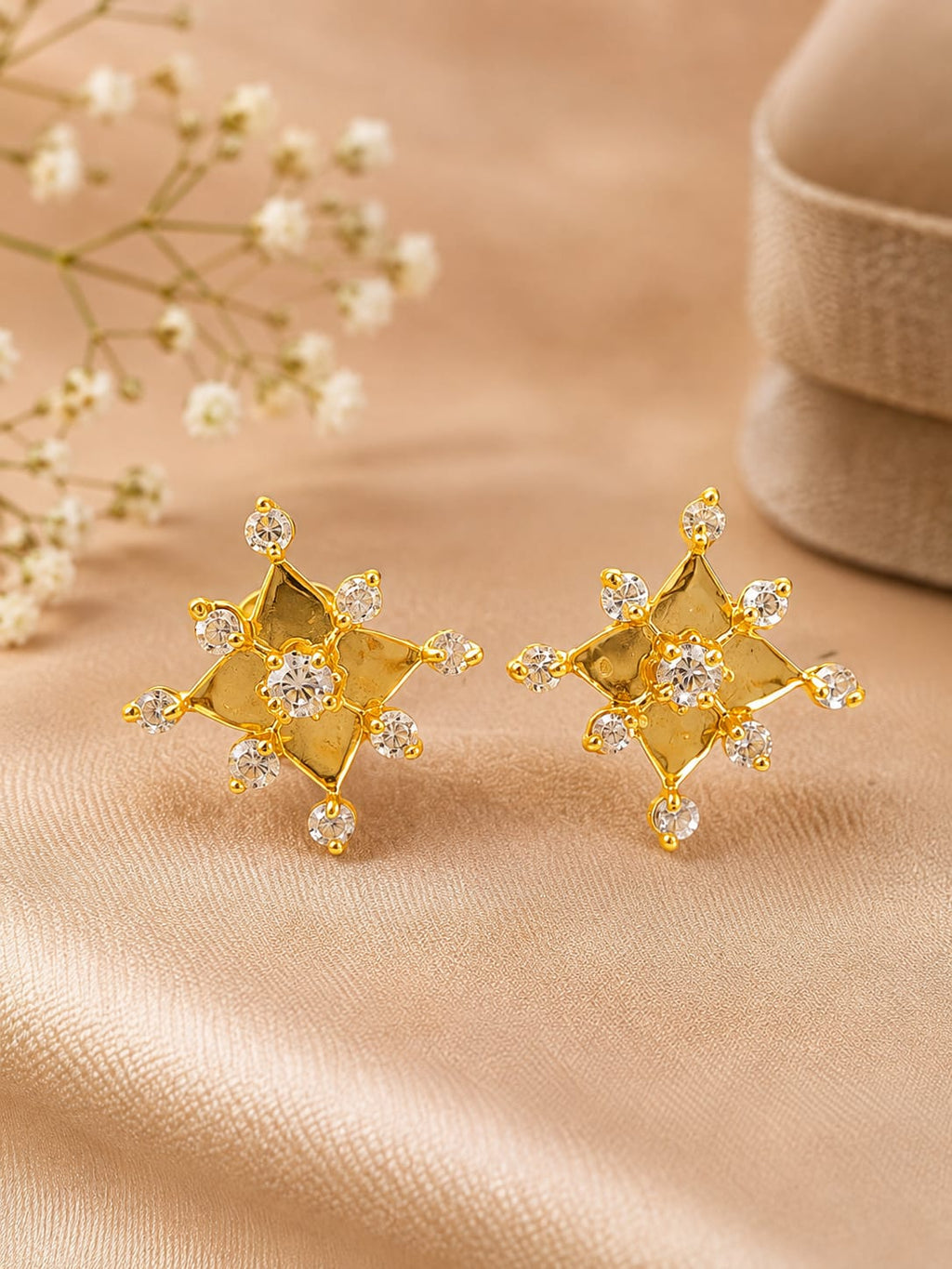 Gold-toned starburst stud earrings