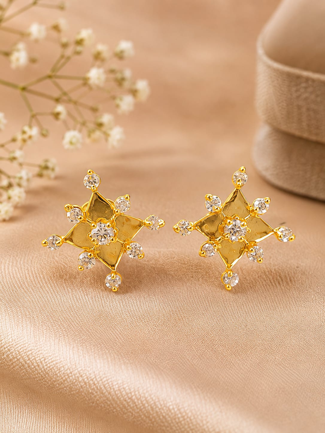 Gold-toned starburst stud earrings