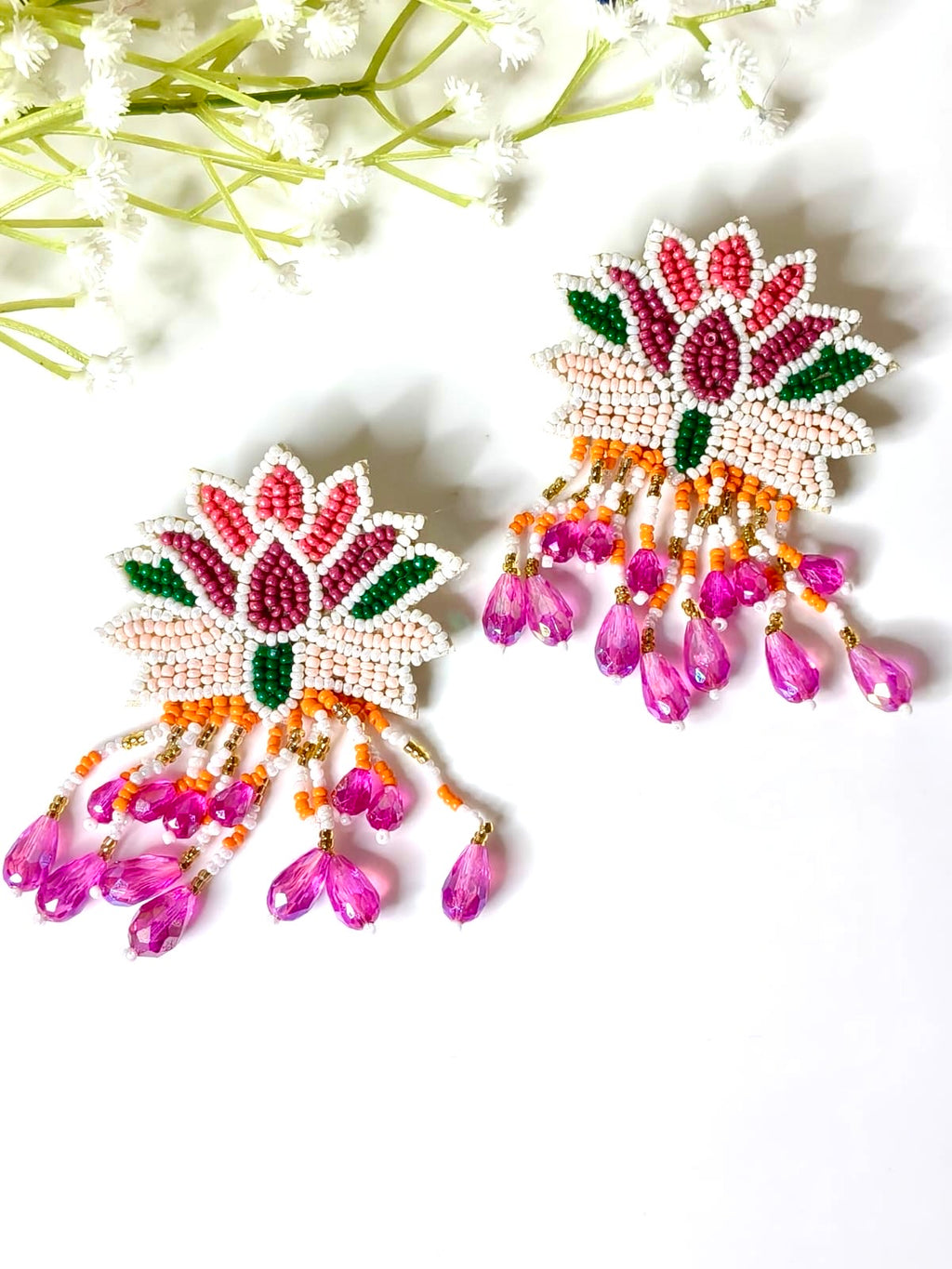 Handcrafted pink and white beaded lotus earrings