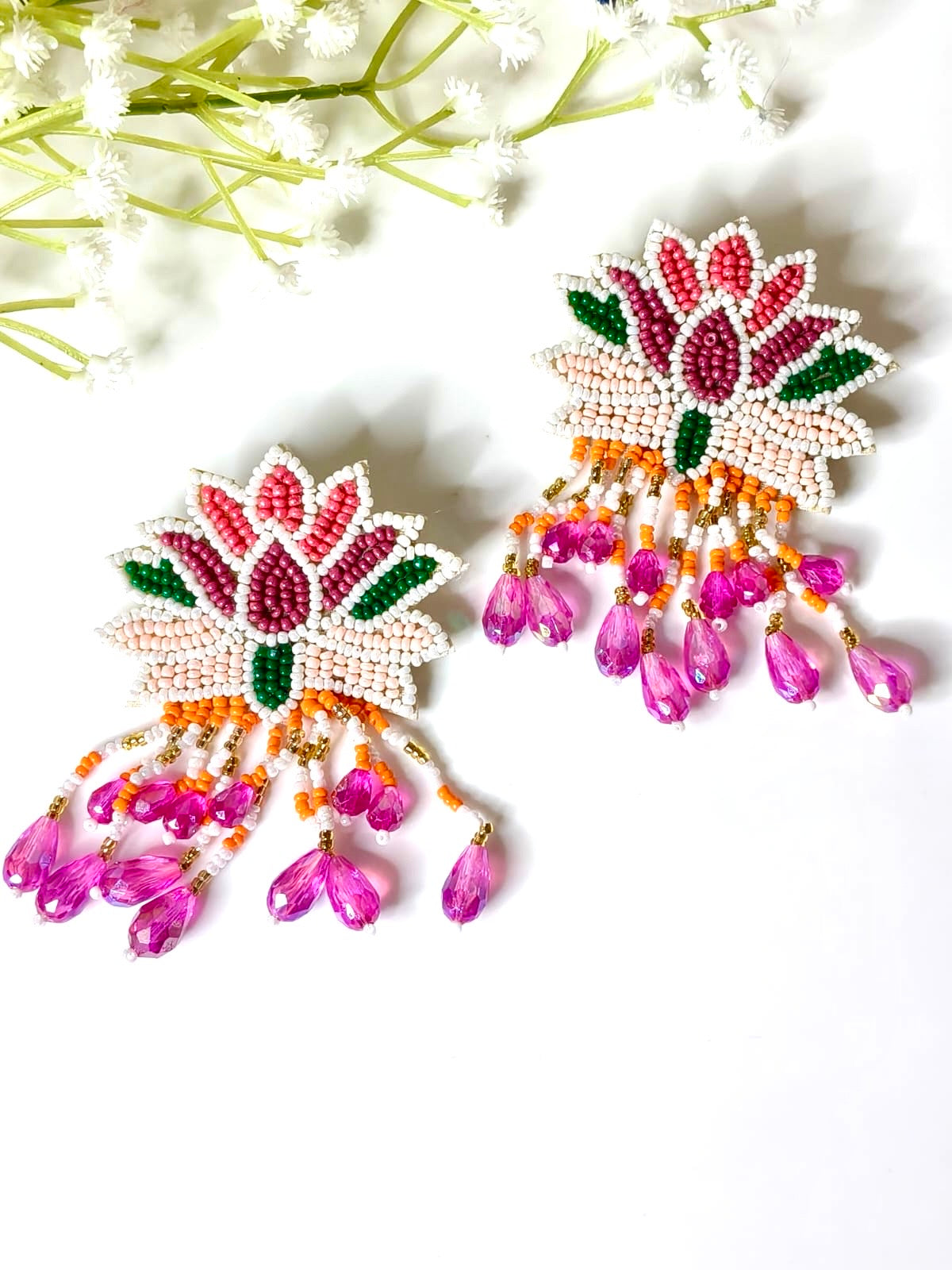 Handcrafted pink and white beaded lotus earrings