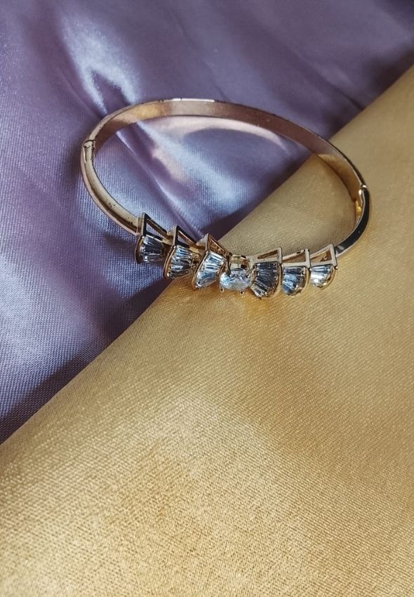AD tie shape bracelet