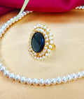 Gold-Plated Circular Stone Cocktail Ring with Pearl Border Accent.
