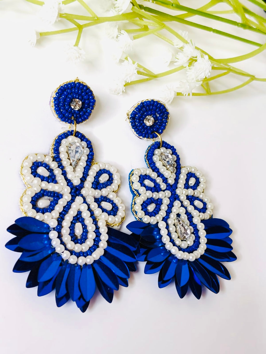 Handmade royal blue and pearl floral beaded drop earrings.