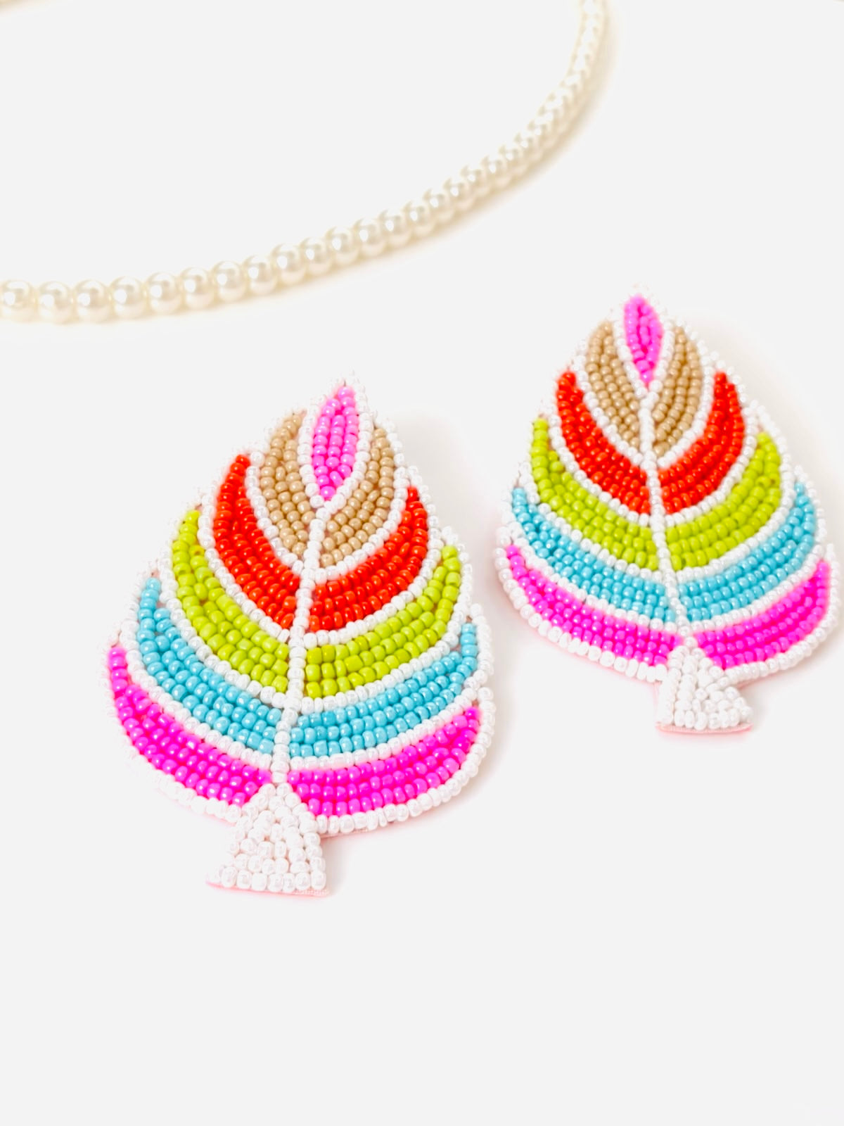 Handmade multi-color palm leaf beaded statement earrings.