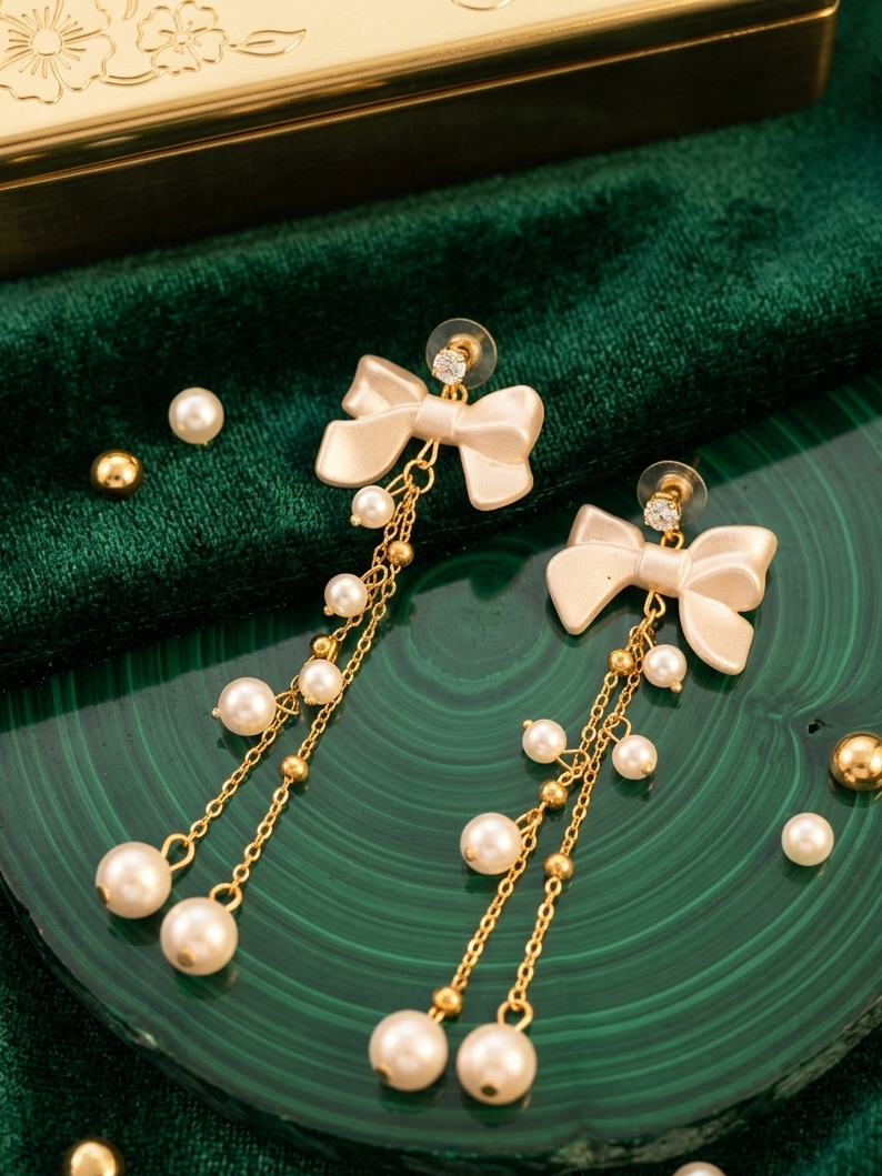 Charming Bow & Pearl Symmetry earrings